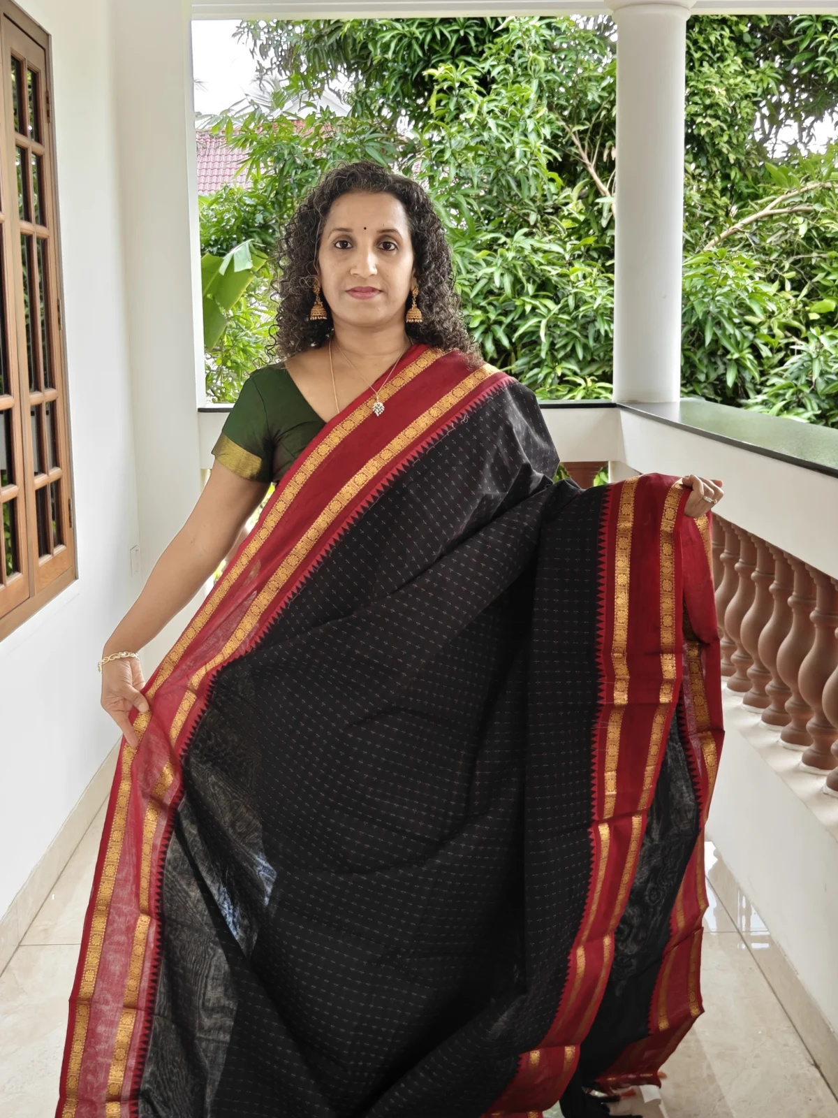 Black Kanchi Cotton Saree with Red and Gold Zari Border